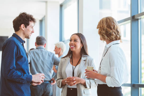 istock Business people in convention center during coffee break 1857509942