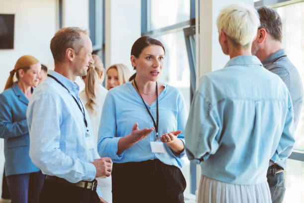 istock Business people in convention center during coffee break 1857510296