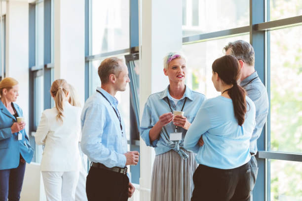 istock Business people in convention center during coffee break 1857510994