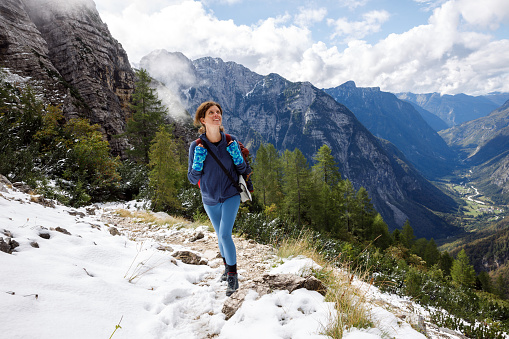 Healthy Lifestyle of a Woman Enjoying her Vacation Hike in Autumn High Mountains Fresh Air