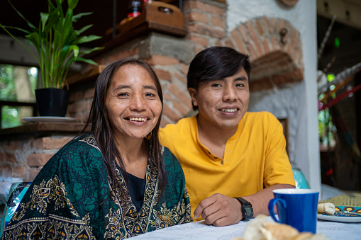 Indigenous family heaving breakfast