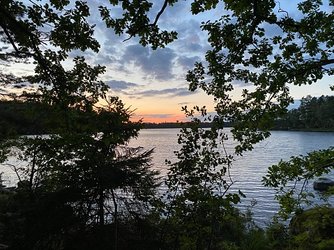 beautiful landscape of a lac and a sunset