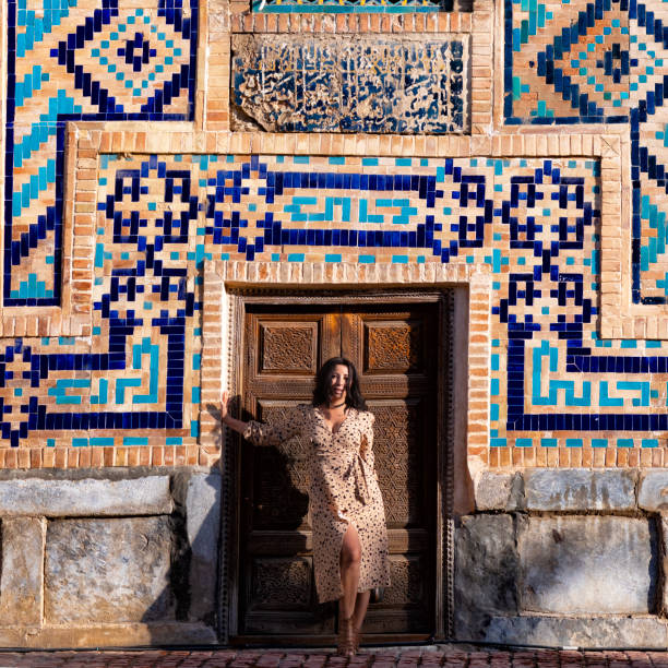 istock Lady posing in the Ulugh Bek Madrassah, Ragistan Square, Samarkand 1857643340
