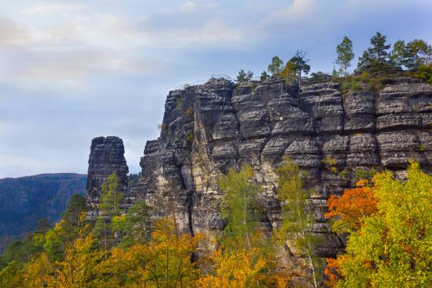 Rock formation in Hrensko, Czech Republic A vantage point on rocky cliff near Pravcicka Brana in Bohemian Switzerland, Czech Republic pravcicka stock pictures, royalty-free photos & images