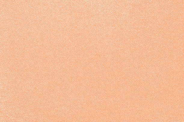 pfirsich flaum glitzer hintergrund folie glitzernde funken pailletten textur pastellfarben orange koralle akte hell aprikose braun blassrosa creme konfetti gefleckt muster körnig bestäuben muttertag urlaub niedlich gala vorlage close-up trendfarbe des ja - holiday paper spotted close up stock-fotos und bilder