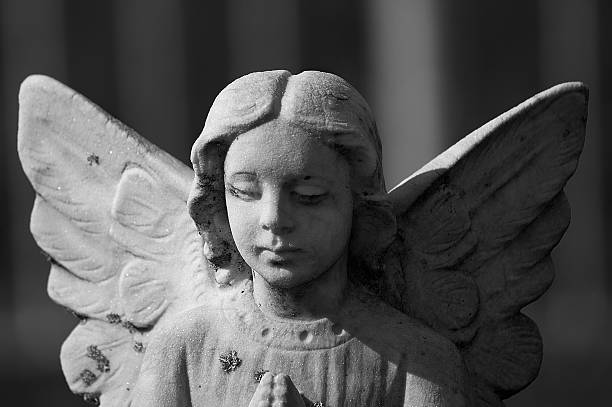 istock Beautiful statue of the angel praying 185774818