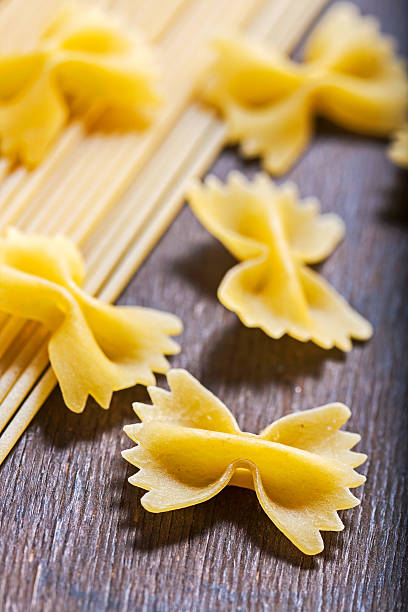 istock Dry pasta in the shape of bows 185774870
