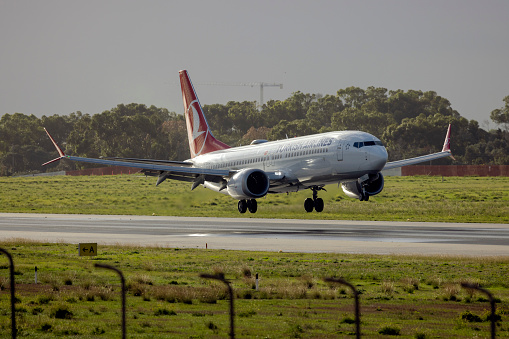 Luqa, Malta - December 15, 2023: Turkish Airlines Boeing 737-8 MAX (REG: TC-LCJ) landing after a shower.