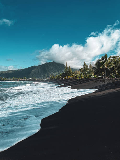 istock dark sand beach in tahiti, french polynesia 1857767692