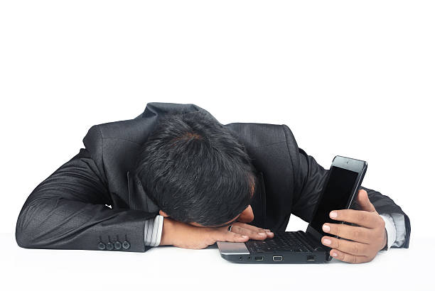 istock Businessman Sleeping over the laptop 185777929