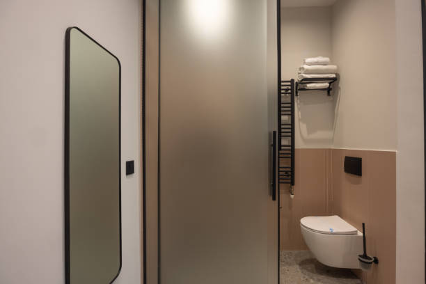 istock Bathroom interior with glass shower cabin 1857784358