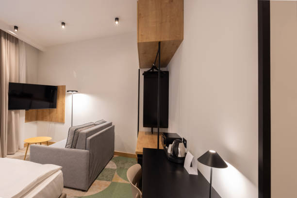istock Interior of a modern hotel room in the evening 1857788119