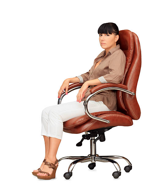 istock Woman sitting in office chair 185780662