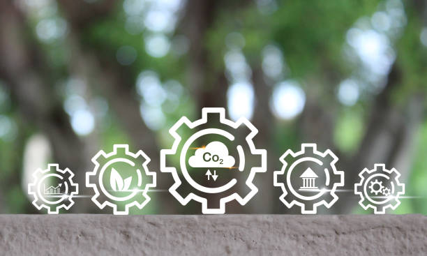 istock Reduce CO2 emission concept. Clean and friendly environment without carbon dioxide emissions.CO2 reducing icon inside magnifier glass for carbon credit to limit global warming from climate change 1857821376