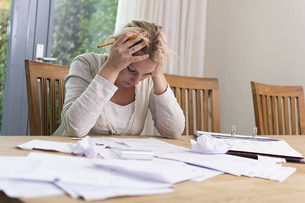 Woman with debts stock photo