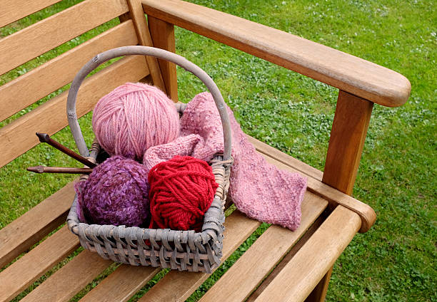 istock Basket of knitting and yarns on a bench 185785322
