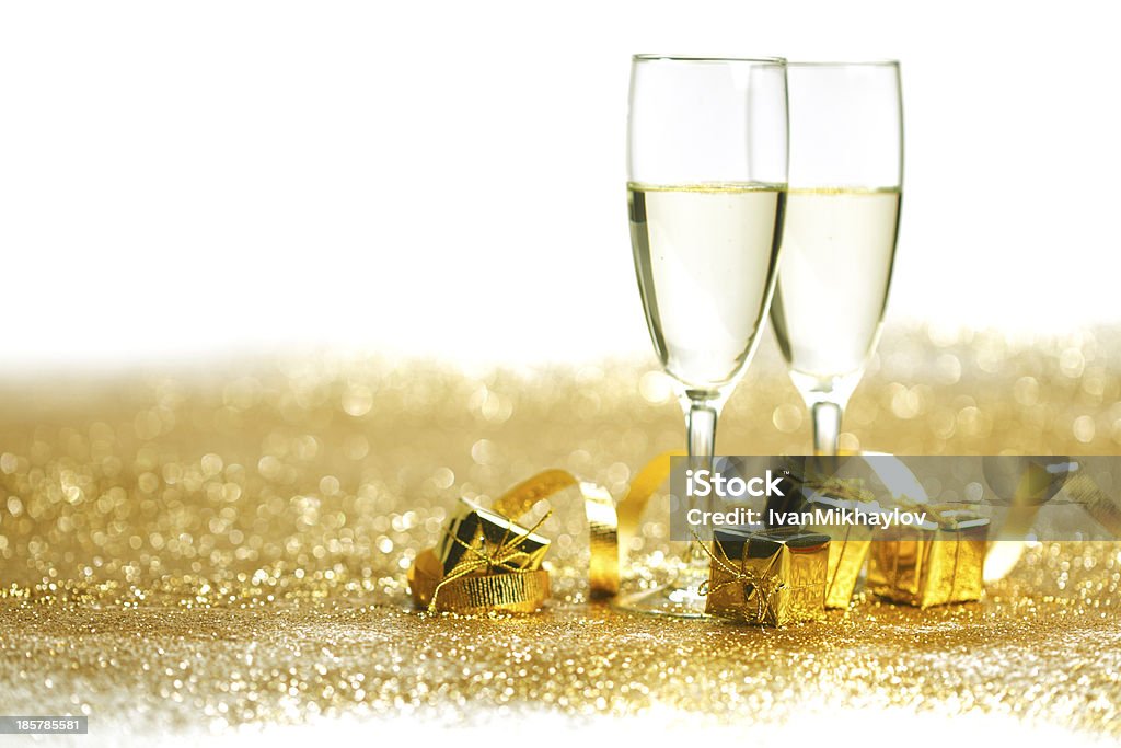 Champagne with christmas present Two glasses of champagne with christmas present and balls Alcohol - Drink Stock Photo