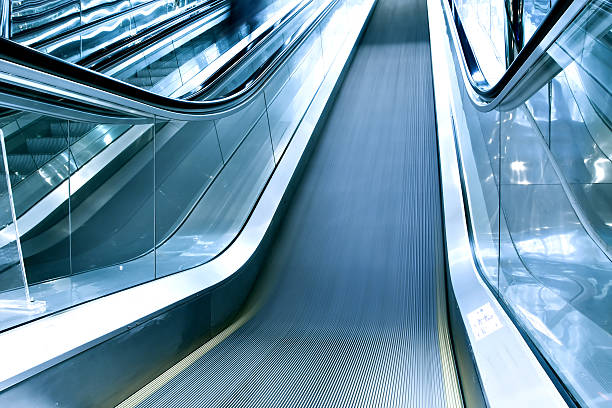 istock movement of business escalator 185787325