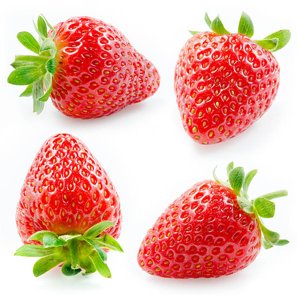 istock Set of four fresh strawberries isolated on white 185787529