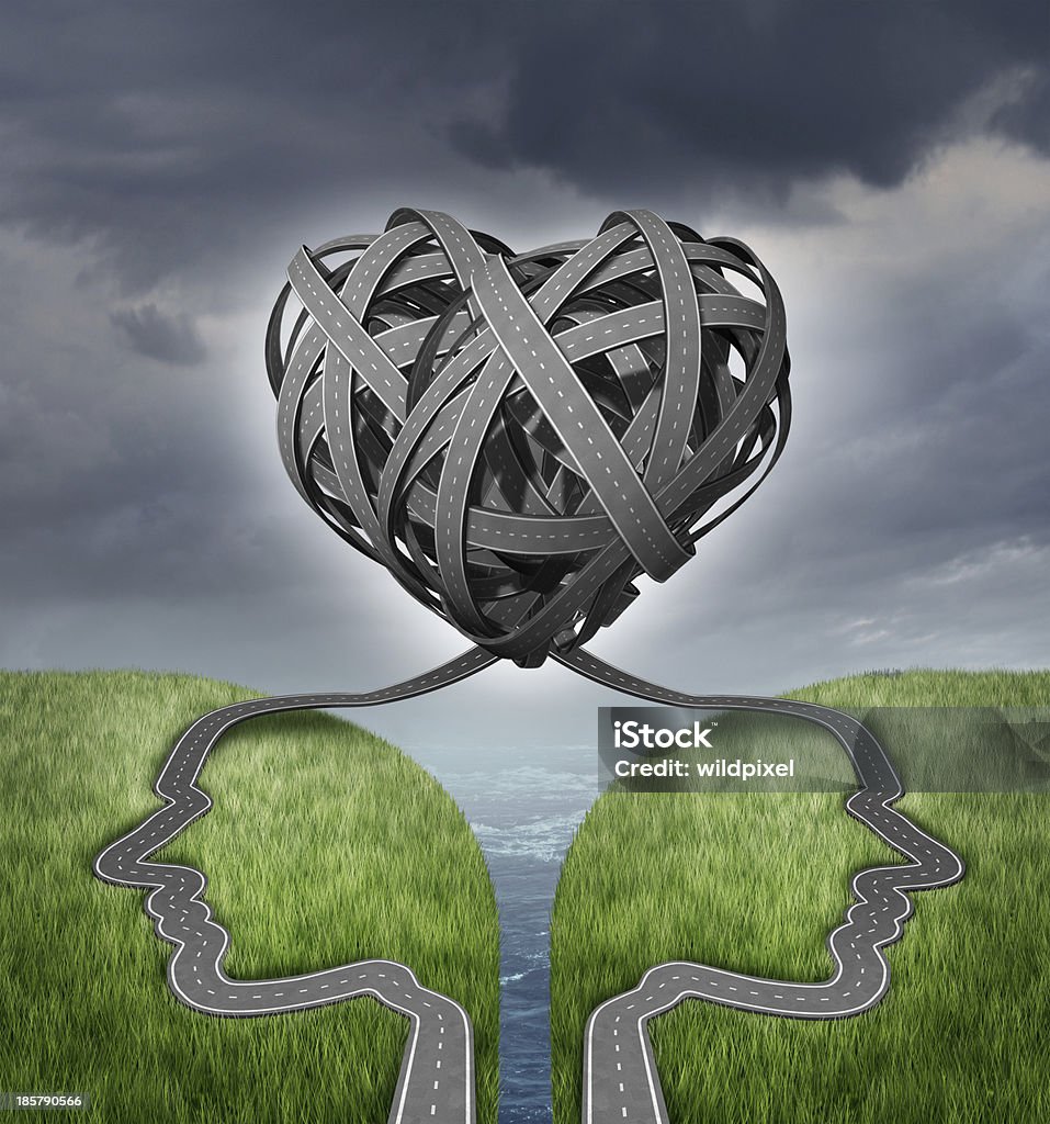 Relationship Direction Relationship direction and couple crisis as a social or sexual concept for marriage counseling with a group of two tangled roads or highways shaped as human heads on a cliff in a shape of a heart. Sex and Reproduction Stock Photo