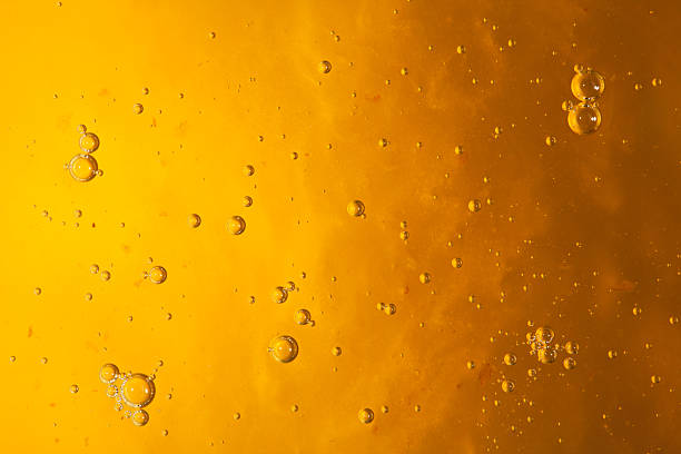 honey liquid background honey liquid background macro closeup honey crisp stock pictures, royalty-free photos & images