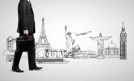businessman walking with briefcase, travel concept