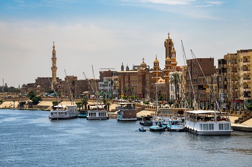 Esna, Egypt, April 14, 2023: View of the quay in the Egyptian town of Esna on the Nile River on a sunny spring day.