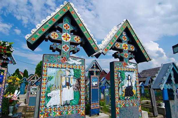 The merry cemetery of Sapanta, Maramures, Romania.This is very famous and probably the most beautiful cemetery in the world. All of the graves are unique and made of wood.