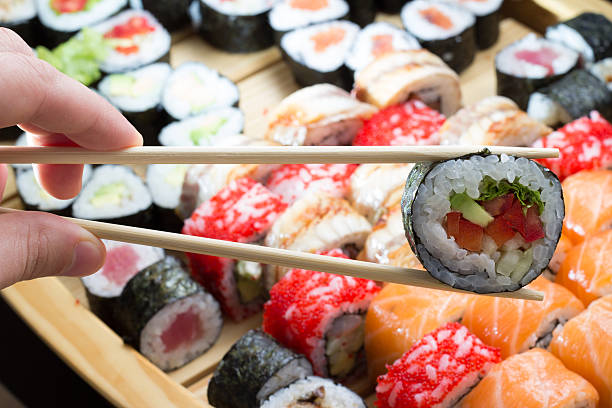 istock Sushi assorti plate and bamboo sticks 185794650