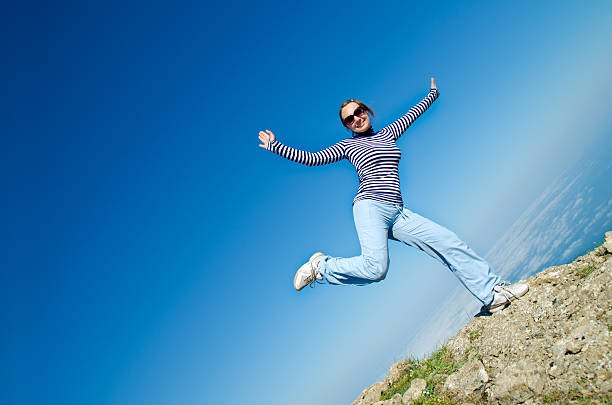 istock woman in mountain 185795440
