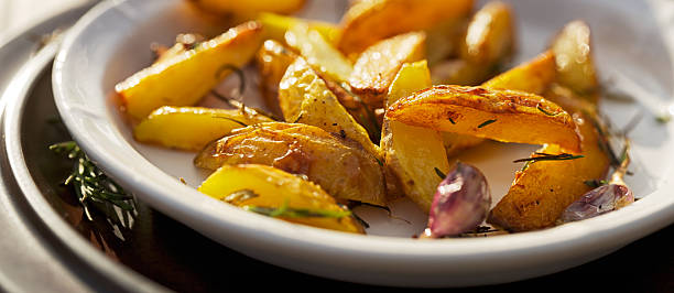 istock Roasted rosemary garlic potato wedges 185797330