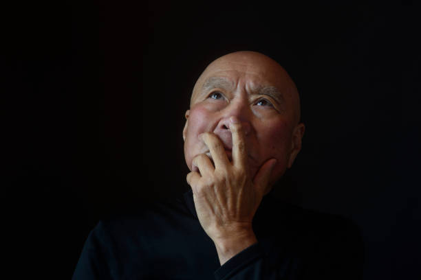 Close-up of senior's troubled face