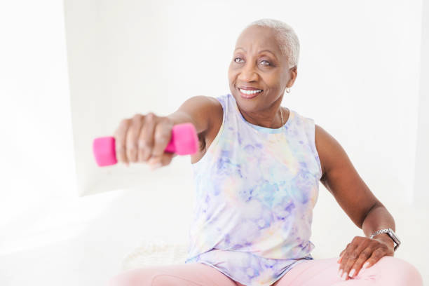 istock Senior Woman Weightlifting 1858028035