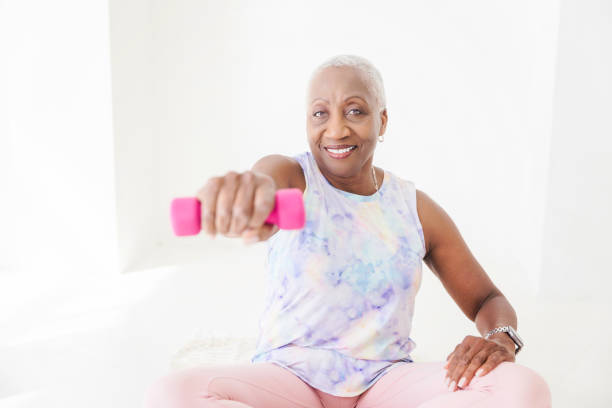 istock Senior Woman Weightlifting 1858028040