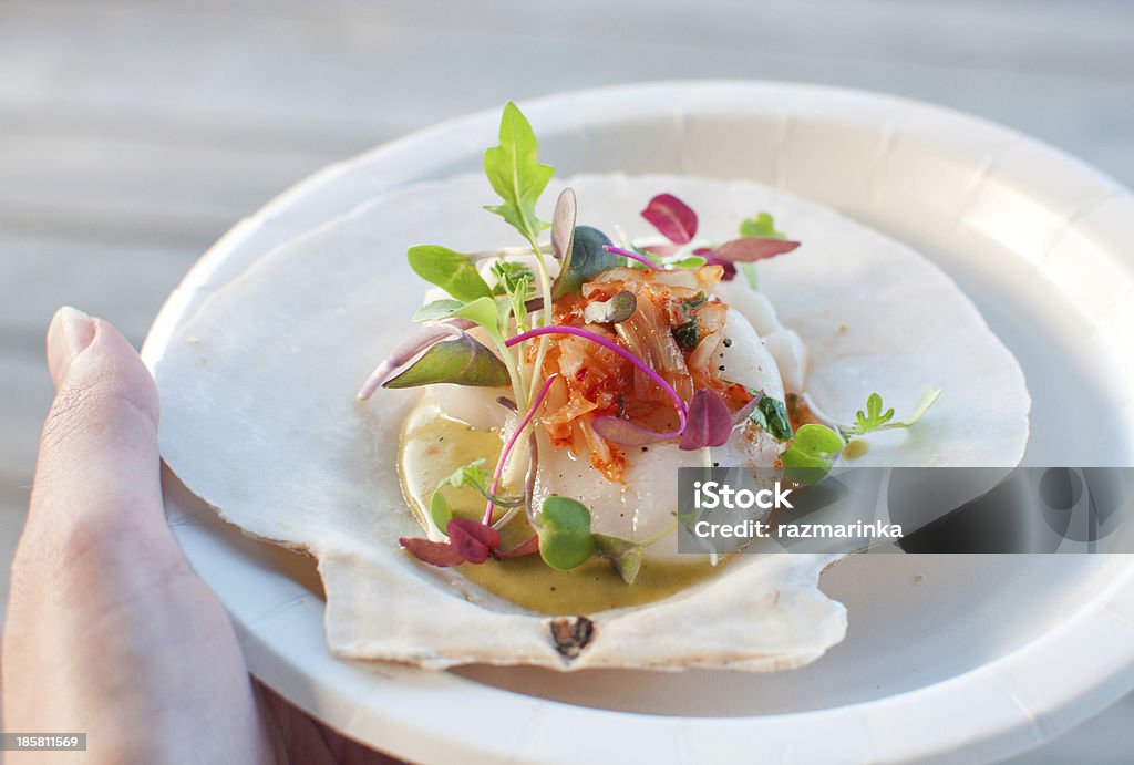 Appetizer ceviche with raw scallop Appetizer ceviche with raw scallop and sauce Scallop Stock Photo