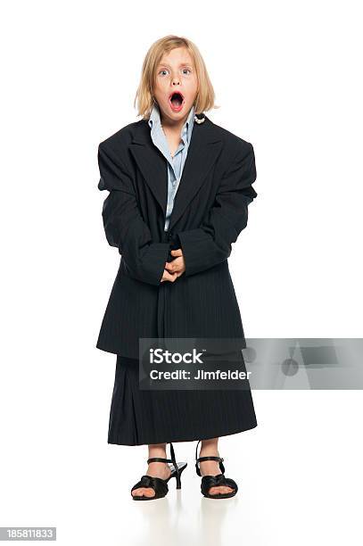 Female Child In Oversized Business Suit With Mouth Open Stock Photo - Download Image Now