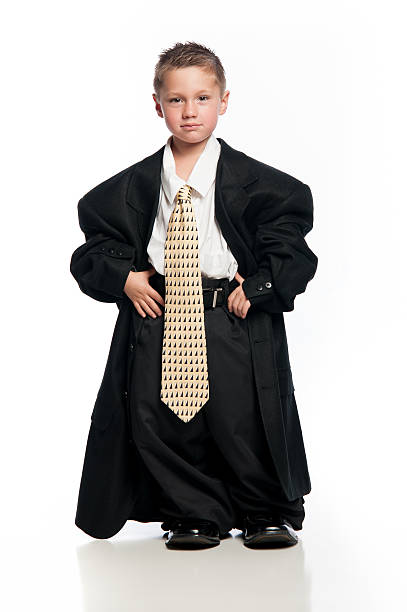 istock Little Boy Wearing Oversized Clothing and Tie 185811840