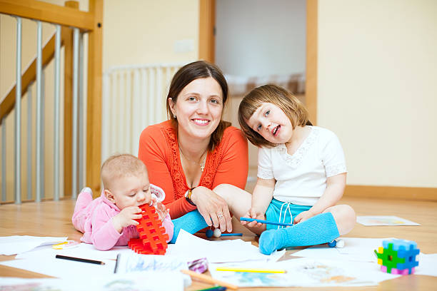 istock Happy mother and her children 185813359