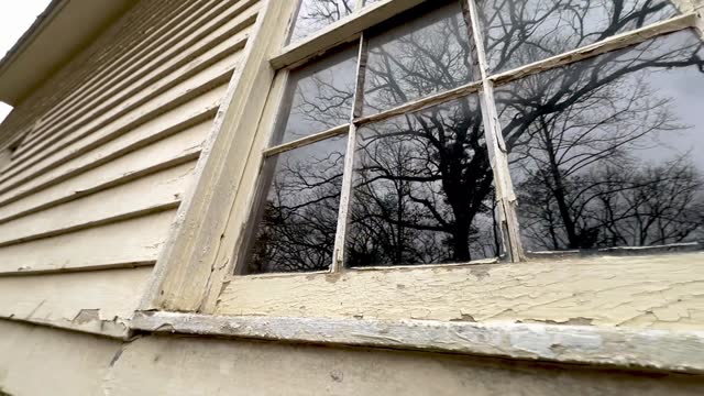 old window and siding on church in cades cove tennessee