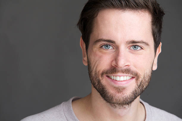 istock Portrait of a charming young man smiling 185821670