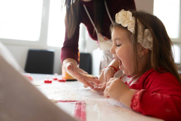 istock Toddler enjoy mom's creativity in the kitchen 1858226608