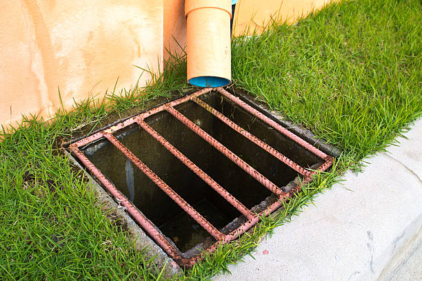 istock Storm water drain near around grass 185822931