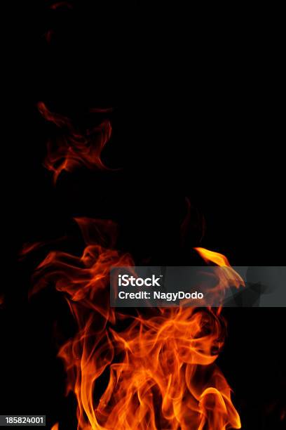 Fuego Sobre Fondo Negro Foto de stock y más banco de imágenes de Abstracto - Abstracto, Amarillo - Color, Azul
