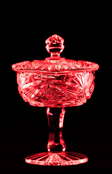 Antique bright crystal holder with lid Antique bright crystal holder with lid isolated on black background crystal chalice stock pictures, royalty-free photos & images