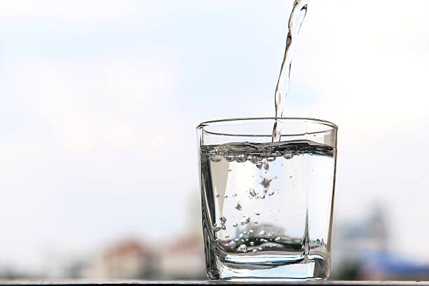 istock Glass of water and sky 185826614