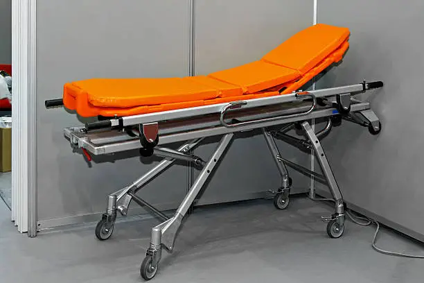 Modern orange multi functional aluminium ambulance stretcher.