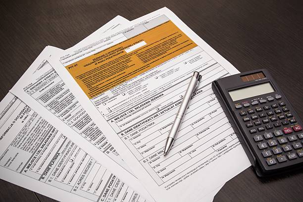 istock Polish tax form with pen and calculator on desk 185829190