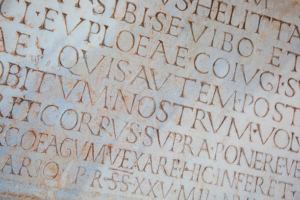 istock Ancient words in latin carved on stone, Pisa 185829256