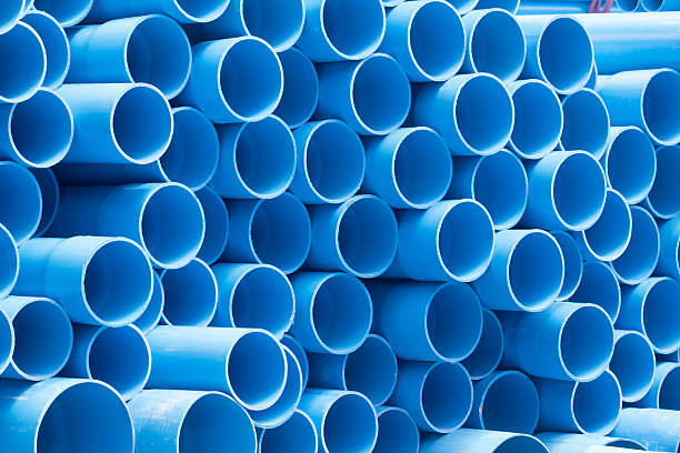 istock PVC pipes staked in construction site 185830701