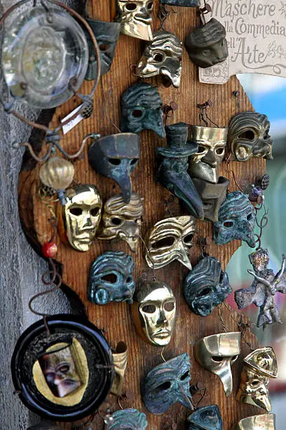 beautiful original Venetian masks handmade in a stand in piazza san marco